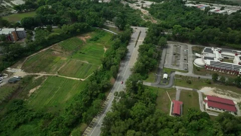 Lush landscape and empty roads in a secluded area surrounded by greenery Stock Footage 311986704