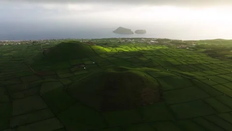 Lush patchwork landscape of Terceira with Pico Dona Joana volcanic cone, aerial 스톡 동영상 299280727
