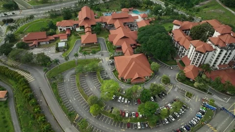 Lush resort complex nestled in a tropical setting surrounded by nature Stock Footage 311987346