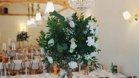 Lush White Rose Centerpiece Decorating Banquet Tables in Elegant Hall Stock-Footage 342022320