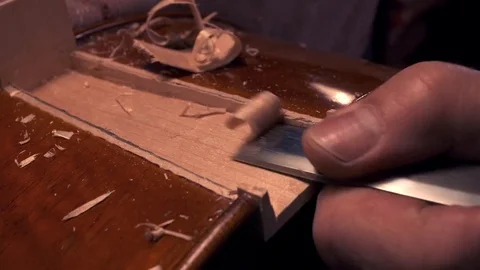 Lute maker carving on cello Video stock 70309730