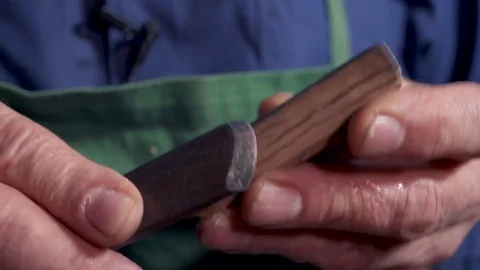 Lute maker sharpening carving tool Video stock 70309141