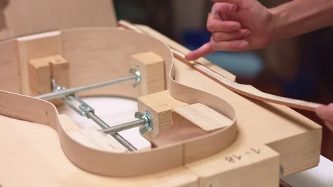 Luthier add glue to lining Stock Footage 117965272