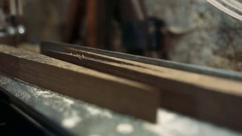Luthier forms a billiard cue running on a band saw. Stock Footage 75950676