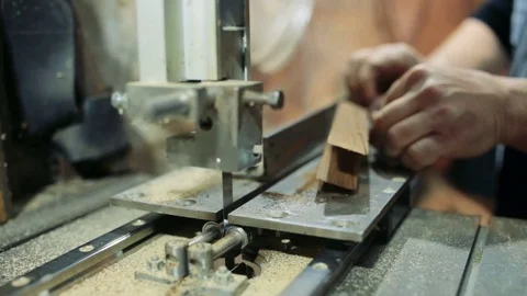 Luthier forms a billiard cue running on a band saw. Stock Footage 75950762