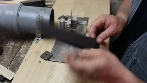 Luthier forms a billiard cue running on a band saw. Stock Footage 76444353