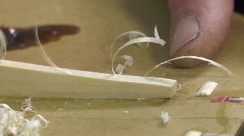 Luthier forms the harmony bar of a violin Video stock 61915146