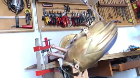 Luthier repairs saxophone in his workshop 스톡 동영상 170672663
