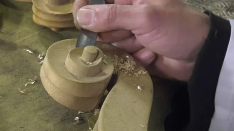 Luthier sculpt a cello head Stock Footage 61914879
