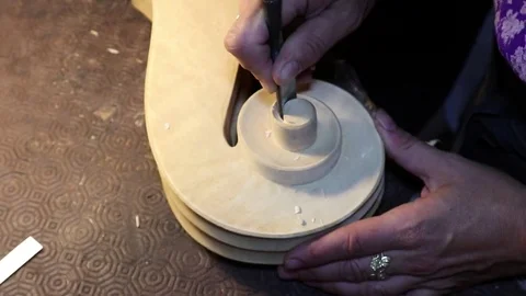 Luthier Sculpt A Cello Head Stock Footage 83447063