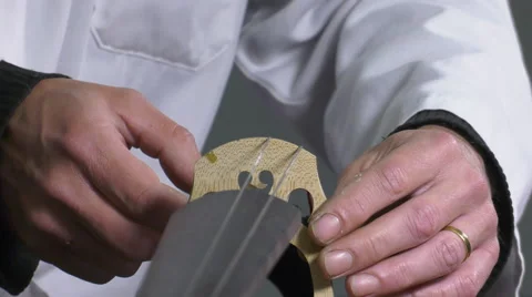 Luthier sets up and adjusts the easel Video stock 61914507