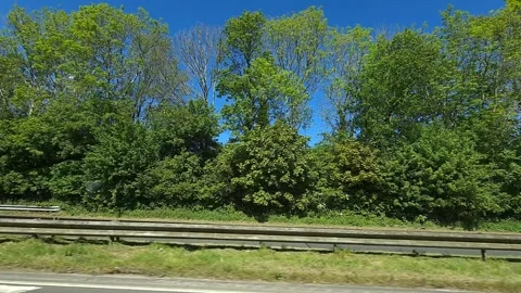 Luton England to Cardiff Wales Car Travel on Highways Sunny Day Stock Footage 336591353