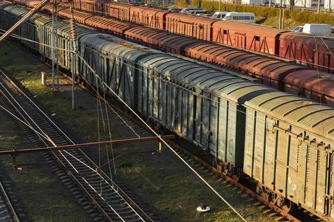 Lutsk, Ukraine - May 26,2021: Cargo train with goods wagon on rails. Roofs of Stock Photos