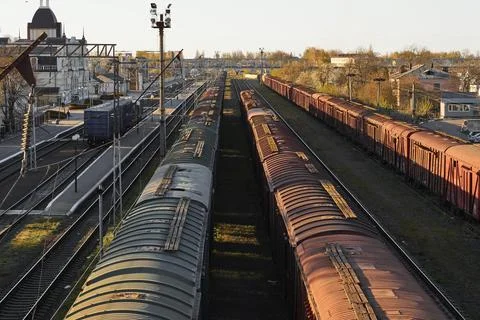Lutsk, Ukraine - May 26,2021: Cargo train with shipping container on rails Stock Photos