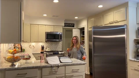 LUX Mom Preparing lunch for school rushing two girls out of large kitchen 스톡 동영상 264906797