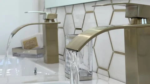 LUX Tiny White Home Gold and White Bathroom Video stock 263455616
