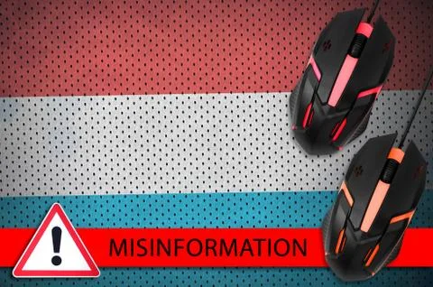 Luxembourg flag and two computer mouses. Misinformation during Coronavirus or Stock Photos