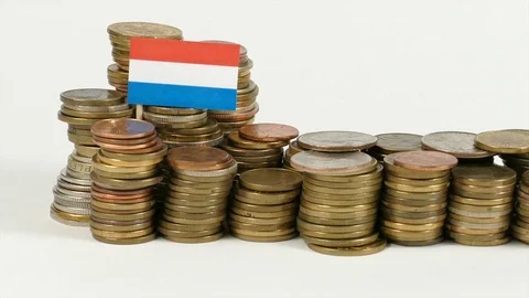 Luxembourg flag waving with stack of money coins Video stock 71978433