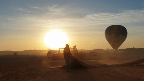Luxor Egypt 22 Dec 2019 Egytian collecting balloon after tourist attraction r Stock Footage 122027433