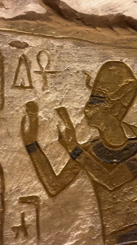 Luxor, Egypt -MARCH 10, 2026: Ancient egyptian hieroglyphs carved in stone wall Stock-Footage 331120308