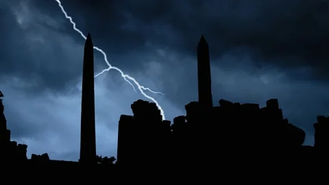 Luxor: Lightning and Thunderstorm flash over Obelisks of Ancient Egyptian Temple Stock Footage 147191708