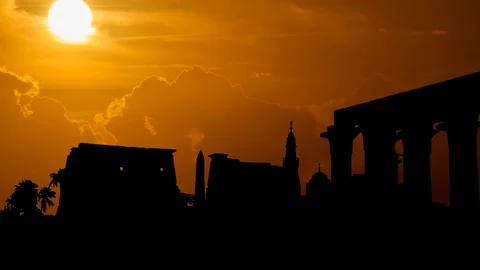 Luxor at Sunset: Egyptian Temple Complex with Obelisk and Colonnades, Egypt Stock Footage 108577690