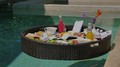 Luxurious floating breakfast in private pool at upscale tropical Vídeos de archivo 271725036