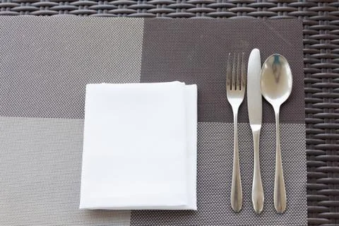 Luxurious fork and spoon on the dining table Stock Photos