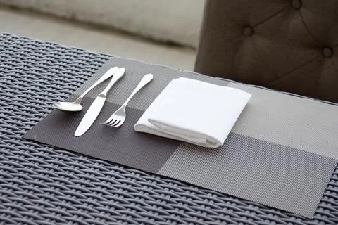 Luxurious fork and spoon on the dining table Stock Photos