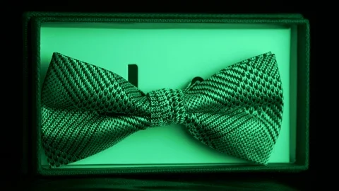 Luxurious geometric pattern silk in retail box- emerald light 4k Stock Footage 98405676