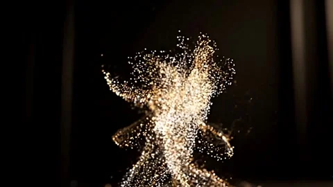 Luxurious Gold Particles in Slow-Motion Spiral Flow Over Deep Black Backgrou Stock Footage 333632454