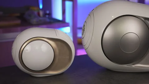 Luxurious golden Devialet Phantom 2 Mini speaker and Devialet Phantom silver Stock Footage 297955257