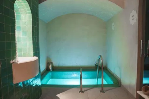 Luxurious Indoor Pool with Marrakech Theme and Turquoise Tiles Stock Photos