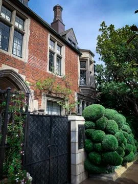 A luxurious mansion red bricks building with fireplace chimney 스톡 사진