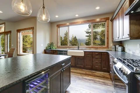 Luxurious open plan kitchen design with large center island, granite counter  Stock Photos