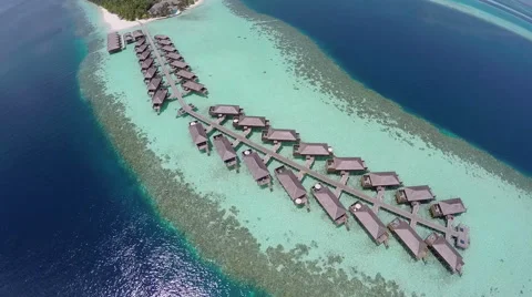Luxurious over-water villas on tropical island resort, Maldives. Stock Footage