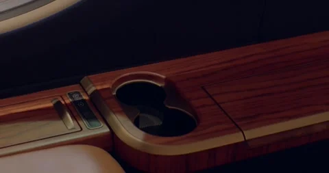 Luxurious smooth wood console featuring builtin cupholder and illumination Видео 333877386