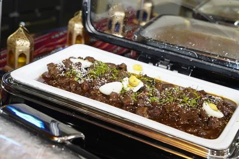 A luxurious spread of tender beef dish, garnished and served at a 5-star in Musc Stock Photos