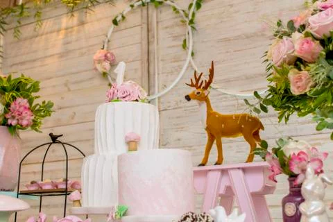 Luxurious table of sweets and birthday cake Stock Photos