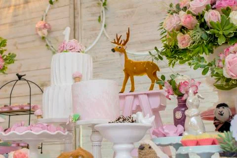 Luxurious table of sweets and birthday cake Stock Photos