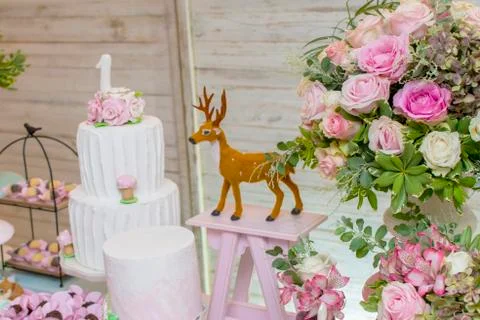Luxurious table of sweets and birthday cake Stock Photos