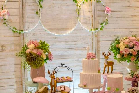 Luxurious table of sweets and birthday cake Stock Photos