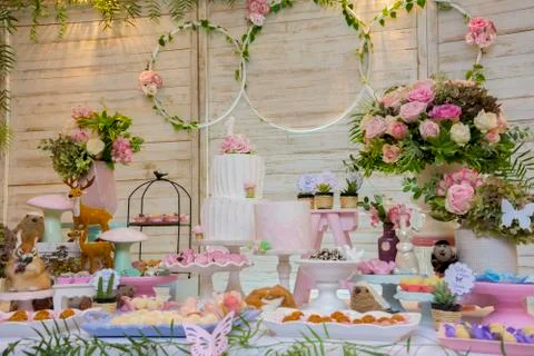 Luxurious table of sweets and birthday cake Stock Photos