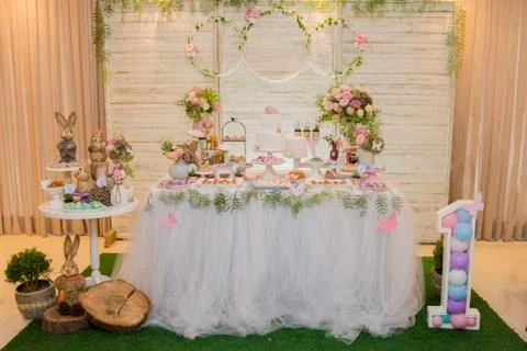Luxurious table of sweets and birthday cake Stock Photos