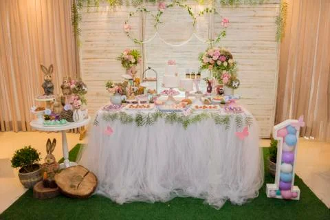 Luxurious table of sweets and birthday cake Stock Photos