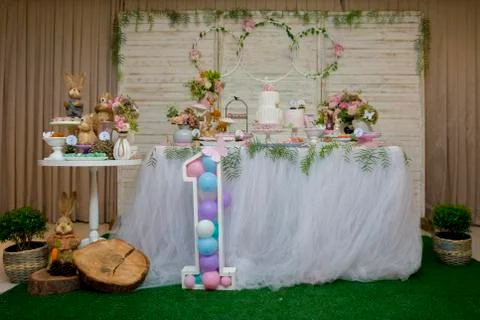 Luxurious table of sweets and birthday cake Stock Photos