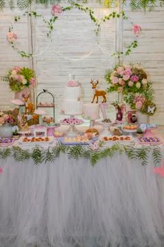 Luxurious table of sweets and birthday cake Stock Photos