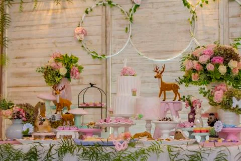 Luxurious table of sweets and birthday cake Stock Photos