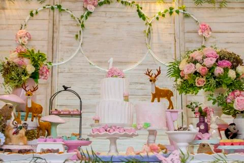 Luxurious table of sweets and birthday cake Stock Photos