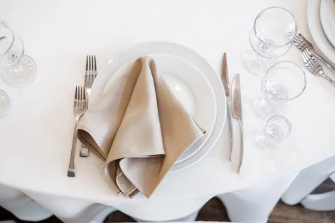 Luxurious wedding table decoration for reception of guests with stylish napkins 스톡 사진